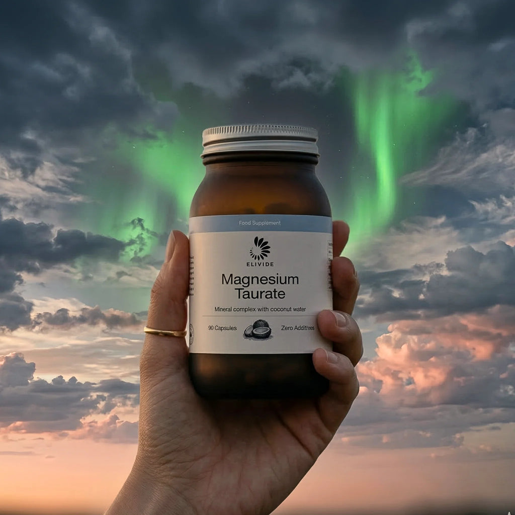 Magnesium taurate supplement ELIVIDE held in hand for relaxation and heart health support