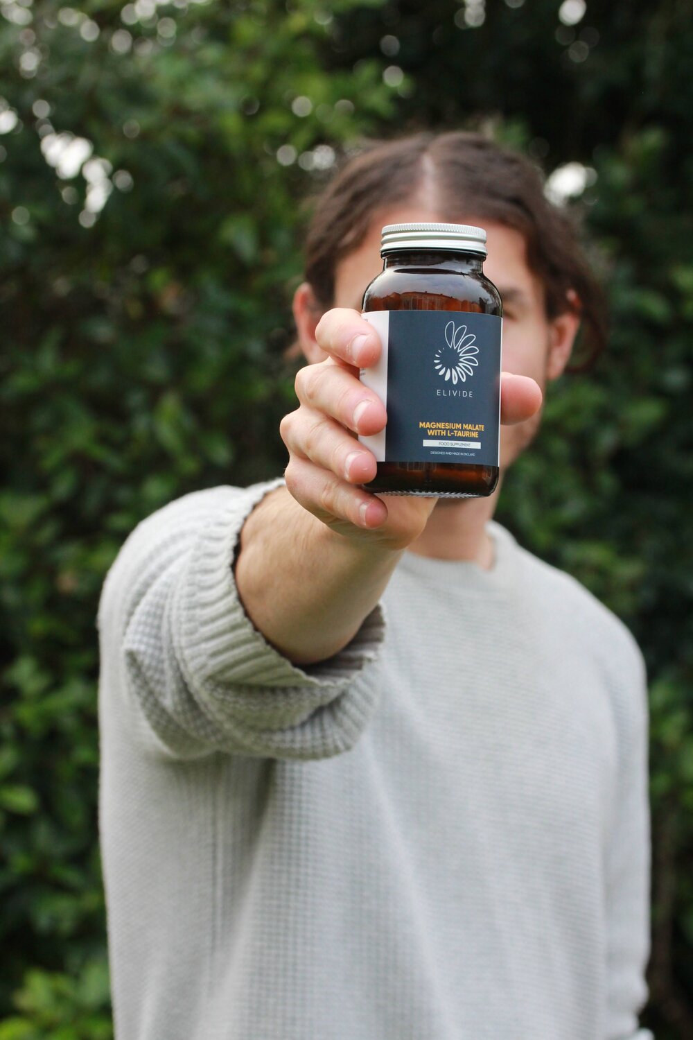 Matt holding the first ELIVIDE formulation, 2021
