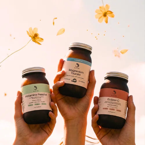 hands holding histamine reset stack ELIVIDE wholefood vitamin C, magnesium taurate, histamine resolve 